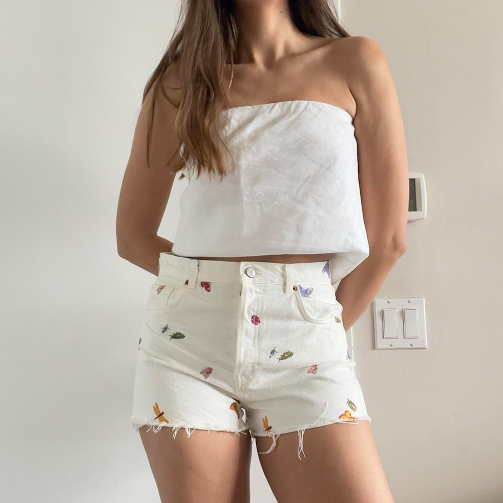 Reformation | White embroidered ladybug "Charlie" high-rise denim shorts | Sz 29